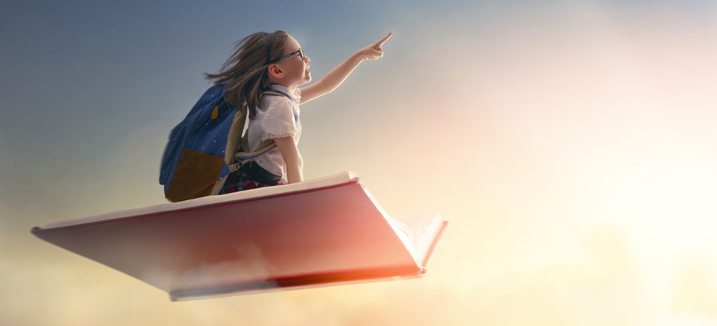 girl student on book flying in the air